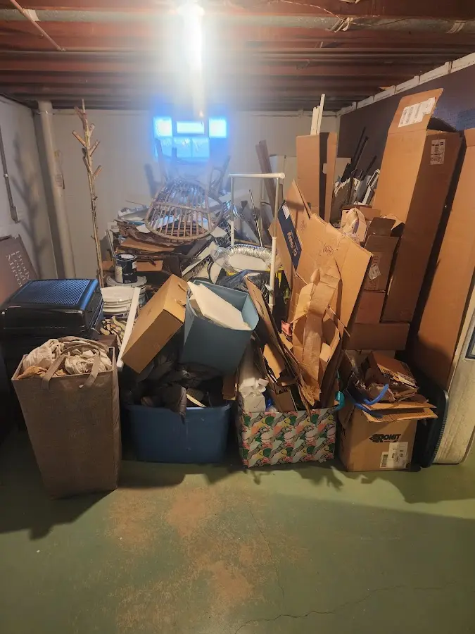 Roll-off dumpster container at job site for 8 Yard Dumpster Rental in Baxter Village